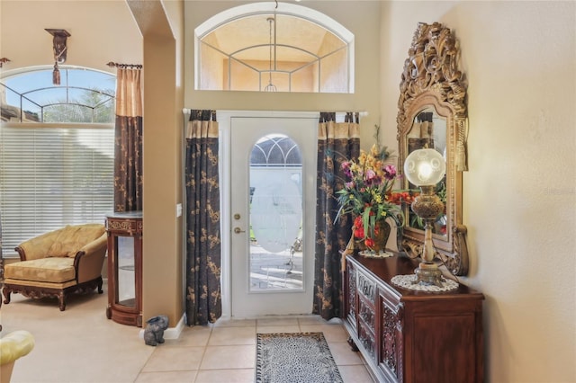 foyer entrance with tile patterned flooring