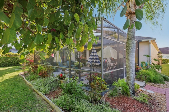 view of yard featuring a lanai