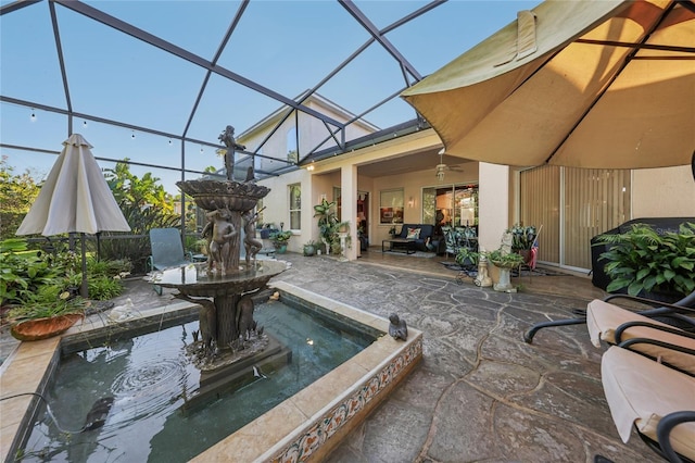 view of patio with a lanai