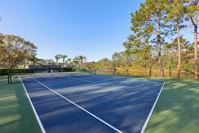 view of sport court featuring community basketball court and fence