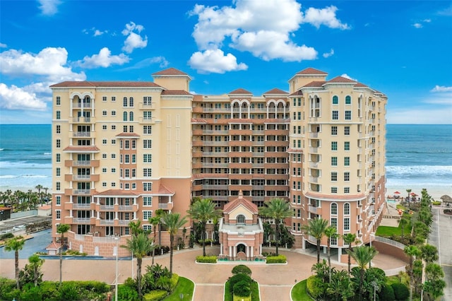 view of building exterior with a water view