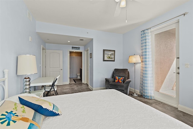 bedroom with ceiling fan, ensuite bathroom, visible vents, and baseboards