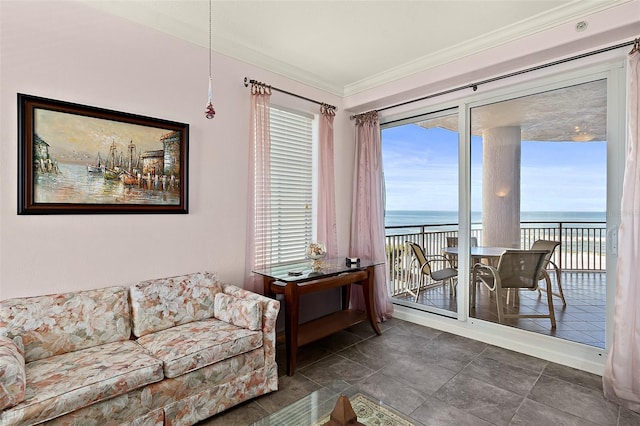 living area featuring a water view, a view of the beach, and crown molding