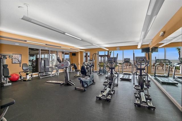 workout area with a textured ceiling