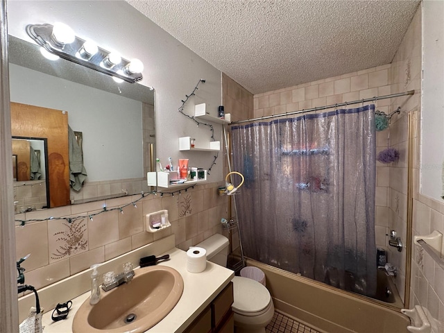 full bathroom with a textured ceiling, toilet, vanity, tile walls, and shower / bath combination with curtain