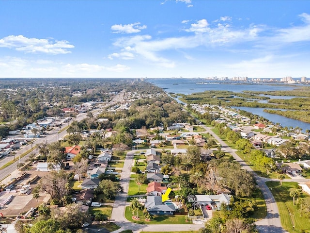 aerial view featuring a residential view, a city view, and a water view