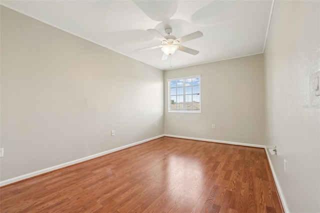 3691 Titanic Cir, Melbourne, FL 32903 - empty room featuring baseboards, wood finished floors, and ceiling fan