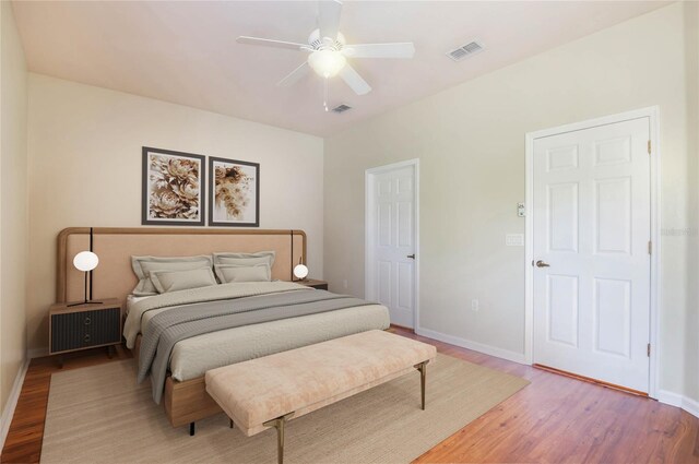 3691 Titanic Cir, Melbourne, FL 32903 - bedroom with light wood-type flooring, baseboards, and ceiling fan