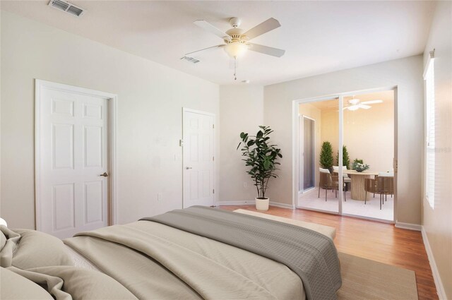 3691 Titanic Cir, Melbourne, FL 32903 - bedroom with light wood-type flooring, baseboards, and ceiling fan