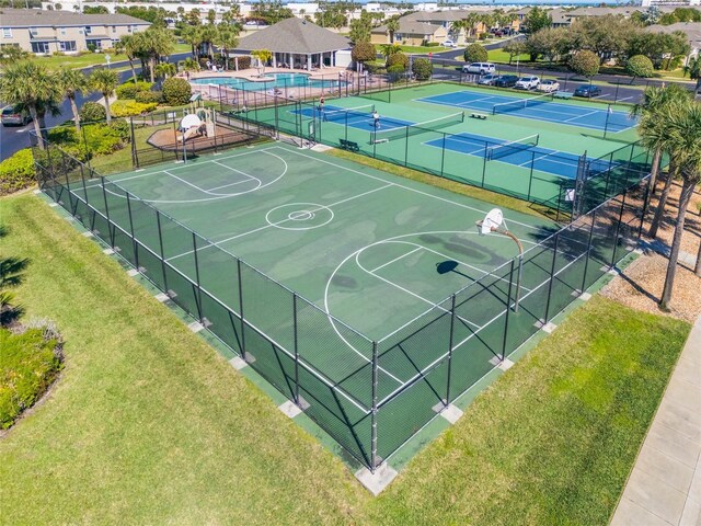 3691 Titanic Cir, Melbourne, FL 32903 - view of sport court featuring community basketball court, a community pool, and a tennis court