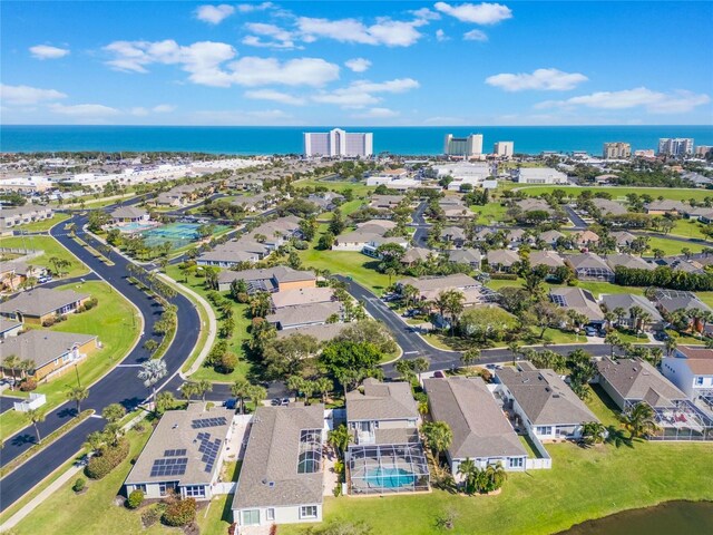 3691 Titanic Cir, Melbourne, FL 32903 - aerial overview of property's location with a large body of water and nearby suburban area