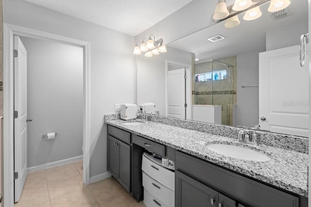 bathroom featuring double vanity, visible vents, a stall shower, a sink, and tile patterned floors