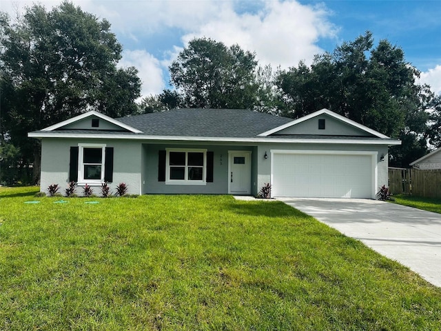 single story home with driveway, an attached garage, fence, a front lawn, and stucco siding