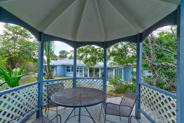 wooden deck with outdoor dining area