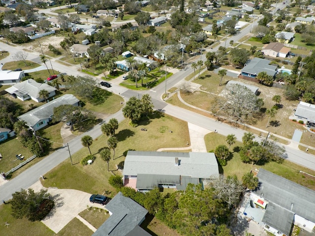 aerial overview of property's location with nearby suburban area