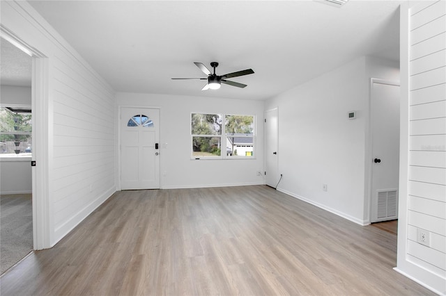 interior space featuring light wood-style floors, visible vents, and a wealth of natural light