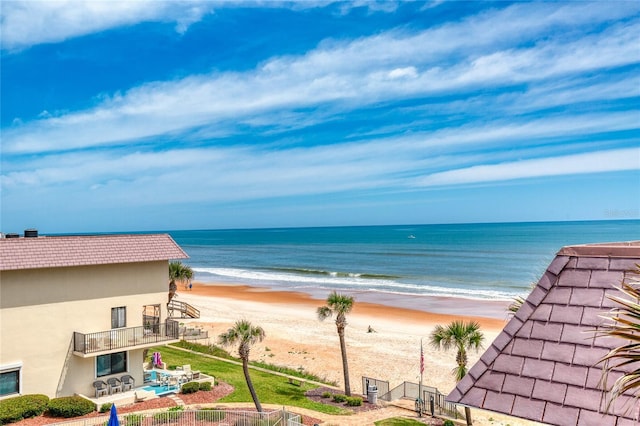 view of water feature with a beach view