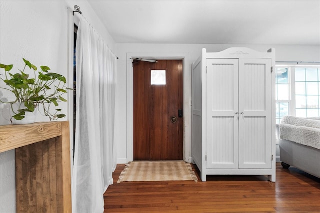 foyer with wood finished floors