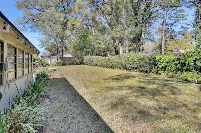 view of yard with fence