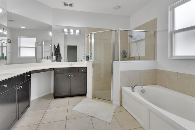 full bath featuring a stall shower, visible vents, a bath, and tile patterned floors