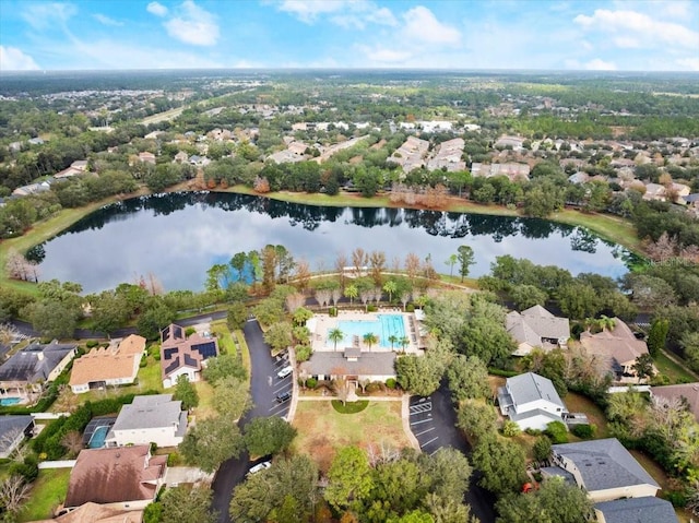 bird's eye view featuring a water view and a residential view