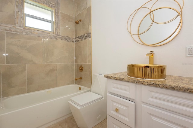 bathroom with toilet, vanity, and shower / bathing tub combination