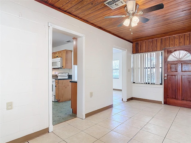 foyer entrance featuring a ceiling fan, wood ceiling, visible vents, and light tile patterned floors