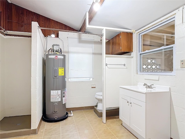 bathroom with lofted ceiling, water heater, toilet, vanity, and walk in shower