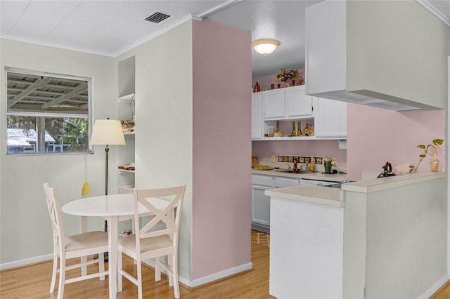 kitchen featuring open shelves, light wood-type flooring, visible vents, and white cabinets