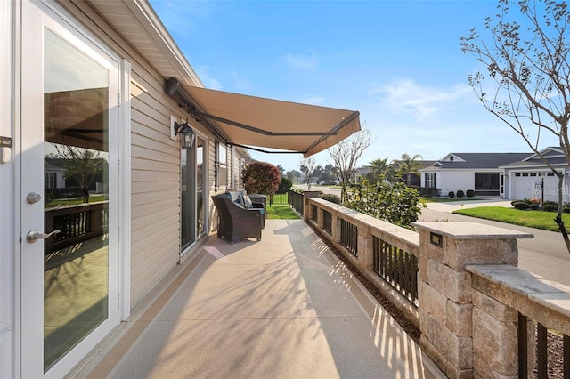 view of patio with a residential view