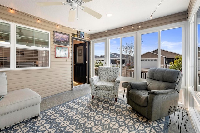 interior space with a ceiling fan