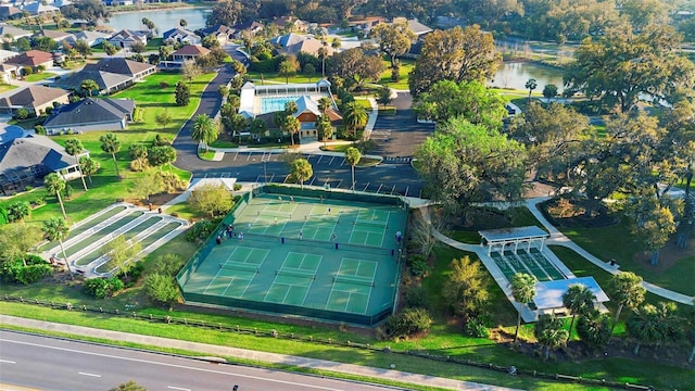 aerial view featuring a water view and a residential view