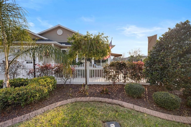 view of front of property with fence