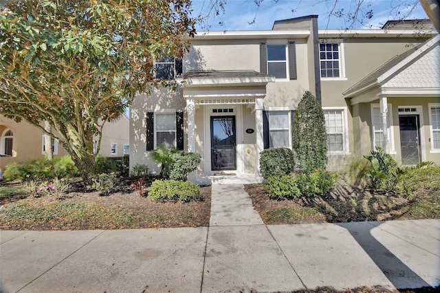 view of property with stucco siding