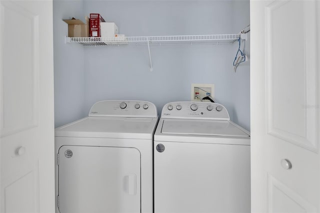 laundry area featuring laundry area and washer and dryer