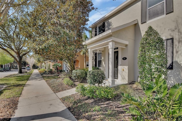 view of property exterior with stucco siding