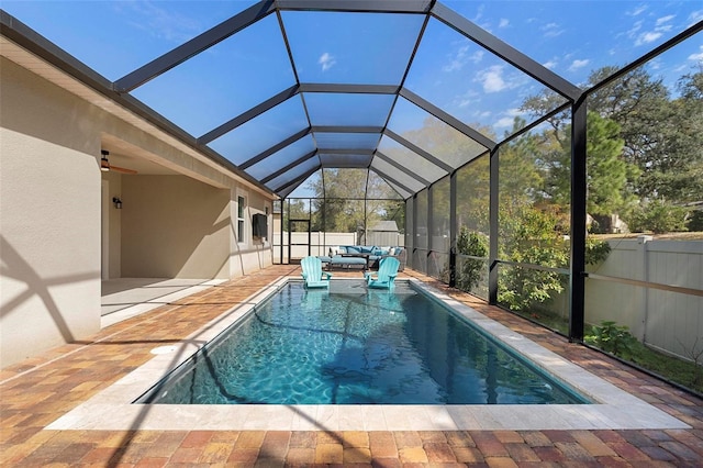 view of pool featuring an outdoor hangout area, a patio, a fenced backyard, and a fenced in pool