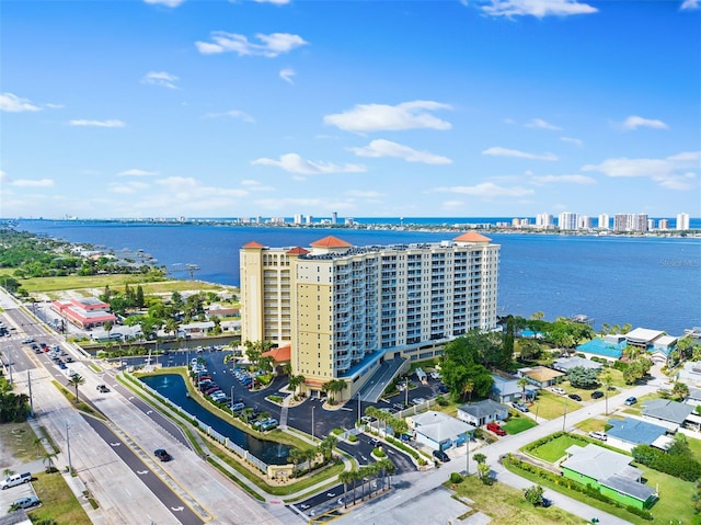 aerial view featuring a water view and a view of city