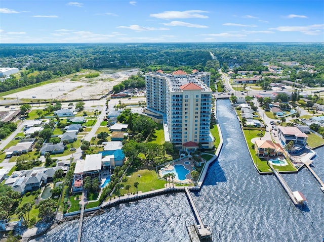 birds eye view of property with a water view