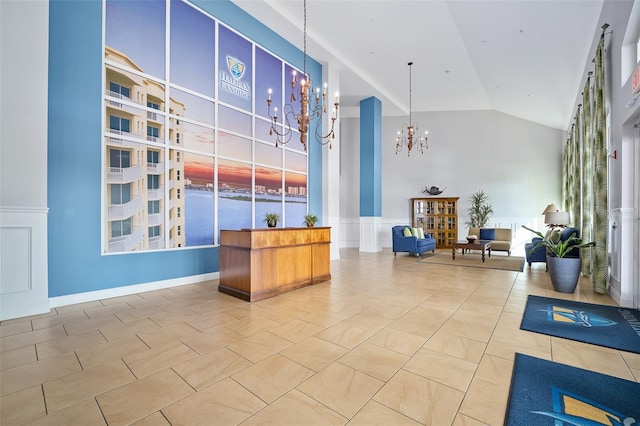 welcome area featuring a chandelier and a water view