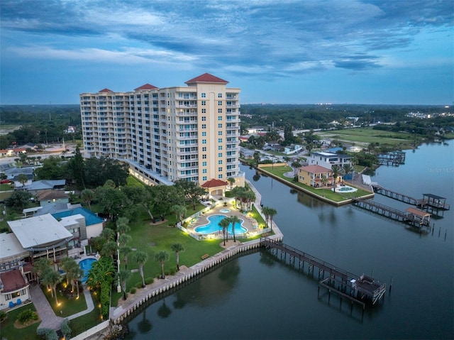 birds eye view of property featuring a water view