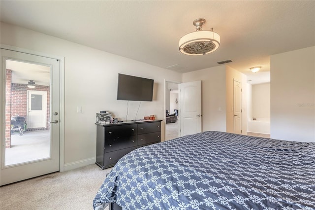 bedroom with carpet, visible vents, and baseboards