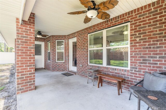 view of patio featuring ceiling fan