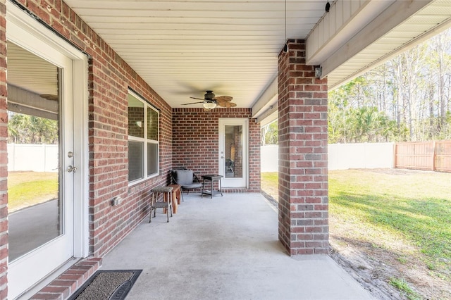 view of patio / terrace featuring a fenced backyard and a ceiling fan