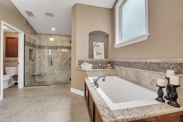 bathroom with toilet, a stall shower, visible vents, and a bath