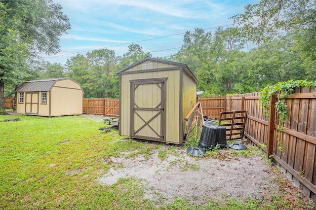 view of shed with a fenced backyard