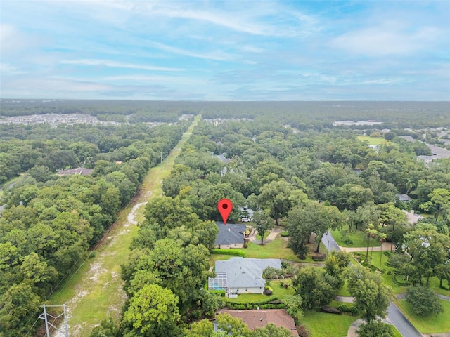 bird's eye view featuring a view of trees