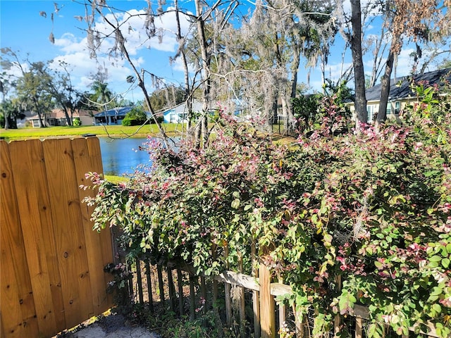 1118 Meditation Loop, Port Orange, FL 32129 - view of yard with a water view and fence