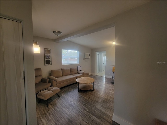 305 Elsie Ave, Daytona Beach, FL 32117 - living area with an AC wall unit, wood finished floors, beam ceiling, and baseboards