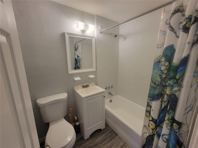 305 Elsie Ave, Daytona Beach, FL 32117 - full bathroom with shower / tub combo with curtain, vanity, toilet, and wood finished floors